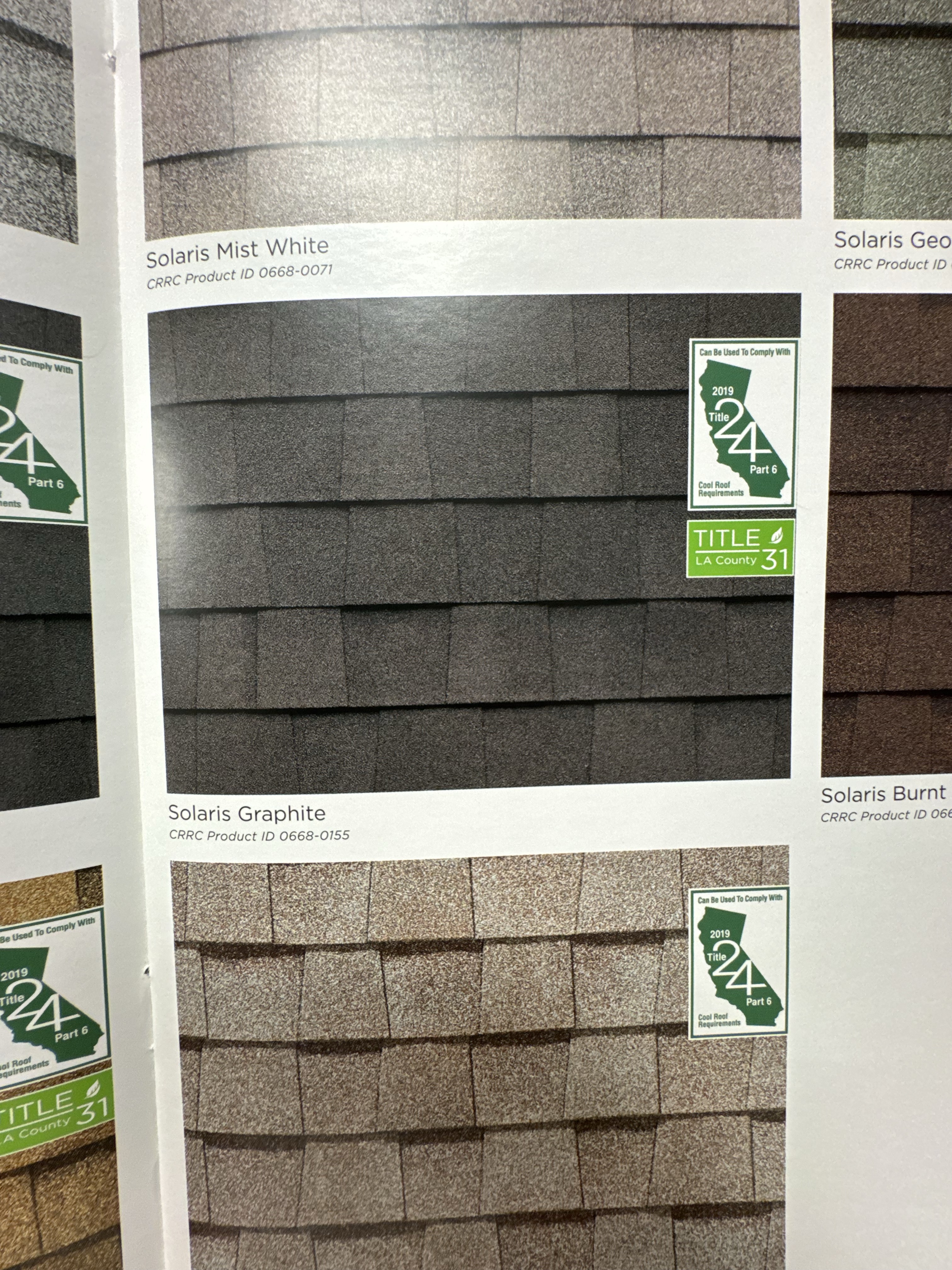 Roofing shingle color sample book for material selection with client.